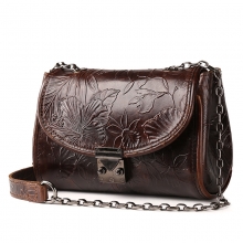 China factory cheap price embossed flowers pattern brown leather sling bag for women